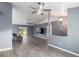 Open living room with gray walls and wood-look floors at 35 Teak Rd, Ocala, FL 34472