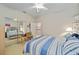 Cozy bedroom with mirrored closet doors and an attached bathroom at 7066 Sw 91St Ct, Ocala, FL 34481
