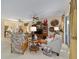 Spacious living room showcasing comfortable seating, tasteful decor, and lots of natural light at 7066 Sw 91St Ct, Ocala, FL 34481