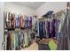 Walk-in closet with ample storage and organization for clothing and personal items at 7066 Sw 91St Ct, Ocala, FL 34481