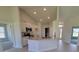 Bright kitchen with white cabinets, granite countertops, and stainless steel appliances at 8357 Sw 58Th Ave, Ocala, FL 34476