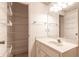 Bathroom with sink, storage, and wire shelving at 2444 Se 18Th Cir, Ocala, FL 34471