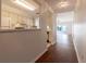 Hallway view of kitchen and living room at 2444 Se 18Th Cir, Ocala, FL 34471