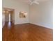 Living room with wood floors and entryway view at 2444 Se 18Th Cir, Ocala, FL 34471