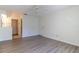 Bright living room featuring wood-look floors and ceiling fan at 2444 Se 18Th Cir, Ocala, FL 34471