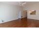 Living room with wood floors and kitchen view at 2444 Se 18Th Cir, Ocala, FL 34471