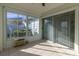 Bright sunroom with tile floors and sliding glass doors at 2444 Se 18Th Cir, Ocala, FL 34471