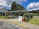 Covered patio with seating welcomes golfers to the Royal Oak Golf Club on a sunny day at 10975 Sw 69Th Cir, Ocala, FL 34476