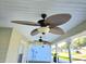 Two ceiling fans on a covered front porch at 10975 Sw 69Th Cir, Ocala, FL 34476