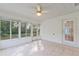 Sunroom with tile floor and access to backyard at 10975 Sw 69Th Cir, Ocala, FL 34476