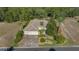 Stunning home featuring a three-car garage, well-manicured landscaping, and a tile roof at 17819 Sw 61St Lane Rd, Dunnellon, FL 34432
