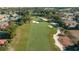 Expansive view of the golf course highlighting the manicured fairways, sand traps and the community's lush landscaping at 17819 Sw 61St Lane Rd, Dunnellon, FL 34432