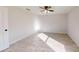 Light-filled bedroom featuring wood-look floors at 232 Locust Pass, Ocala, FL 34472