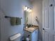 Bathroom with granite vanity and updated fixtures at 3642 Nw 55Th Cir, Ocala, FL 34482