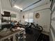 Well-organized craft and sewing room in garage with plenty of storage at 3642 Nw 55Th Cir, Ocala, FL 34482