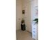 Hallway with decor and a white storage cabinet with three drawers for convenient organization at 547 Tanaro Ln, Haines City, FL 33844