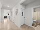 Hallway view leading to the bathroom, living room, and kitchen of the house at 547 Tanaro Ln, Haines City, FL 33844