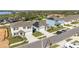 Street view showcasing the home's modern architectural details and the inviting neighborhood at 547 Tanaro Ln, Haines City, FL 33844