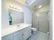 Clean bathroom with a shower/tub combo and updated vanity at 12467 Se 62Nd Ave, Belleview, FL 34420