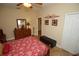 Cozy bedroom featuring a wood bed frame, neutral wall color, and closet at 16331 Sw 12Th Ter, Ocala, FL 34473