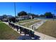 Recreational shuffleboard area with courts and seating, providing a relaxing and enjoyable outdoor activity space at 16331 Sw 12Th Ter, Ocala, FL 34473