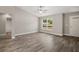 Bright living room with front door access and large window at 176 Pine Crse, Ocala, FL 34472