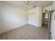 A bedroom featuring tile floors, a ceiling fan, and a closet at 6688 Sw 113Th Pl, Ocala, FL 34476