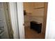 Walk-in closet with shelving units, hanging rods, and tiled floors at 6688 Sw 113Th Pl, Ocala, FL 34476