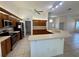 Spacious kitchen with a breakfast bar, ample counter space, and lots of cabinetry at 6688 Sw 113Th Pl, Ocala, FL 34476