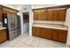 Spacious kitchen boasts stainless steel appliances, granite countertops, and ample storage at 6688 Sw 113Th Pl, Ocala, FL 34476