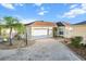 Lovely one-story home featuring a driveway, well-maintained landscaping, and a one car garage at 1106 Liendo Ln, The Villages, FL 32162