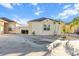 Beautiful single-story home with a driveway, decorative stone landscaping and mature palm trees at 1106 Liendo Ln, The Villages, FL 32162