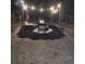 Relaxing backyard firepit area, perfect for evenings with string lights and seating at 538 Bahia Circle Ter, Ocala, FL 34472