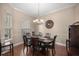 Formal dining room with hardwood floors and chandelier at 5425 Se 44Th Cir, Ocala, FL 34480