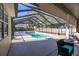 Enclosed rectangular pool with screened enclosure at 5425 Se 44Th Cir, Ocala, FL 34480