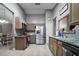 Modern kitchen featuring stainless steel appliances, granite countertops, and neutral-toned cabinetry at 2880 Se 34Th St, Ocala, FL 34471