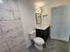 Contemporary bathroom with marble-style shower, vanity, and stylish tile flooring at 3733 Se 137Th Street, Summerfield, FL 34491