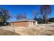 New construction home features stucco exterior, gray roof, and a spacious yard at 3733 Se 137Th Street, Summerfield, FL 34491