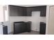 Kitchen features black cabinetry with modern layout and plenty of counter space at 3733 Se 137Th Street, Summerfield, FL 34491