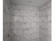 Shower with marble-look tile at 3733 Se 137Th Street, Summerfield, FL 34491
