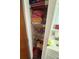 Linen closet with wire shelving providing storage space for toiletries and linens at 8152 Sw 106Th St, Ocala, FL 34481