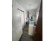 Functional laundry room with storage cabinets, a washing machine, and a dryer at 8152 Sw 106Th St, Ocala, FL 34481
