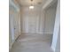 Light and airy entryway with tile floors, high ceilings and a front door with sidelight window at 8309 Sw 58Th Ave, Ocala, FL 34476