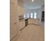 Corner view of the kitchen showcasing granite countertops and stainless steel appliances at 8309 Sw 58Th Ave, Ocala, FL 34476