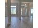 Light and airy living room with tile floors, high ceilings and lots of natural light at 8309 Sw 58Th Ave, Ocala, FL 34476