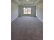Large primary bedroom with ample space and natural light at 8309 Sw 58Th Ave, Ocala, FL 34476