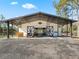 View of Horse Barn with lounge, bar seating, and chandelier, seamlessly blending function with luxury at 965 Nw 73Rd Ter, Ocala, FL 34482