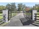 Modern black metal gate leading to a private property at 965 Nw 73Rd Ter, Ocala, FL 34482