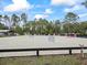 Photo of the jump facility with various colored jumps, and a surrounding border fence at 965 Nw 73Rd Ter, Ocala, FL 34482