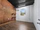 Tack room with wood paneling, and wall mounted saddle horns at 965 Nw 73Rd Ter, Ocala, FL 34482